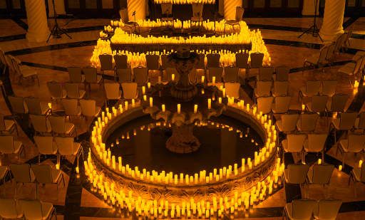 The Hotel Colonnade Coral Gables rotunda set with hundreds of candles for a Candlelight concert